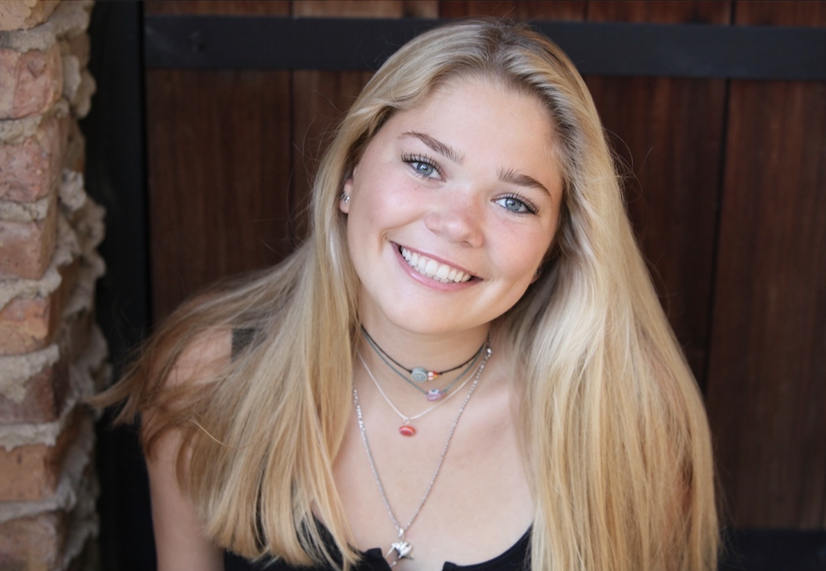 Jordan smiling at camera.