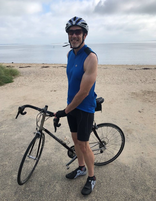 Dr. Brock While Cycling (Photo Courtesy of Dr. Brock)