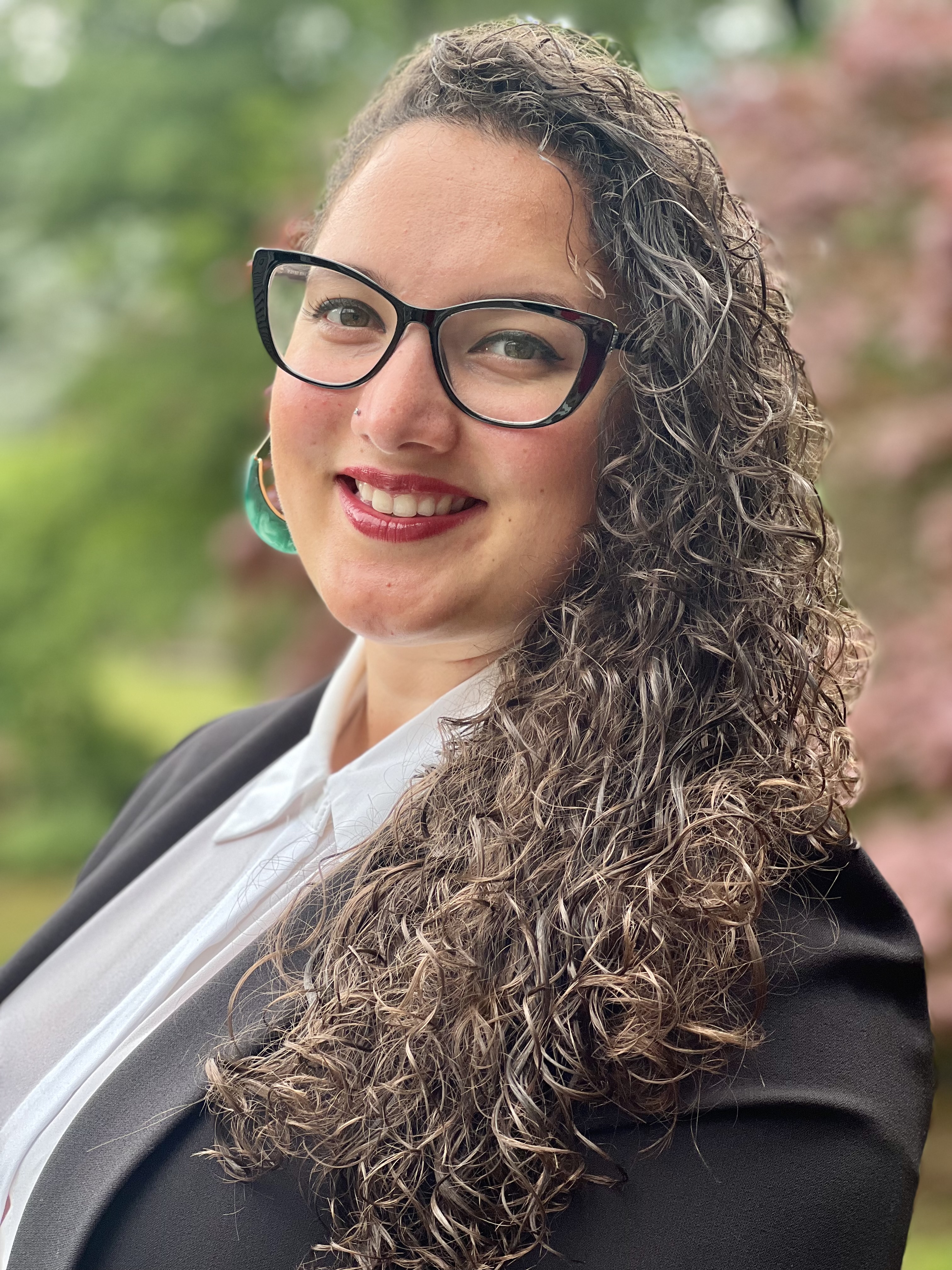 Photo headshot of Tiffany Garcia (she/her)