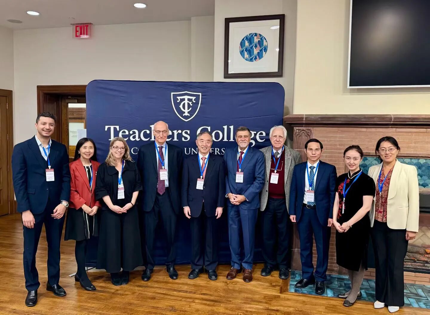 Teachers College leadership and representatives from partner universities