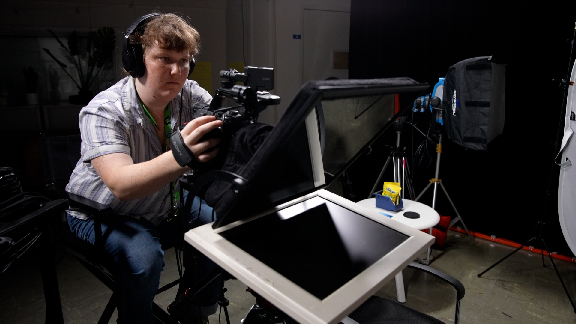 Mara Danoff operating a camera with teleprompter in Macy Studio A