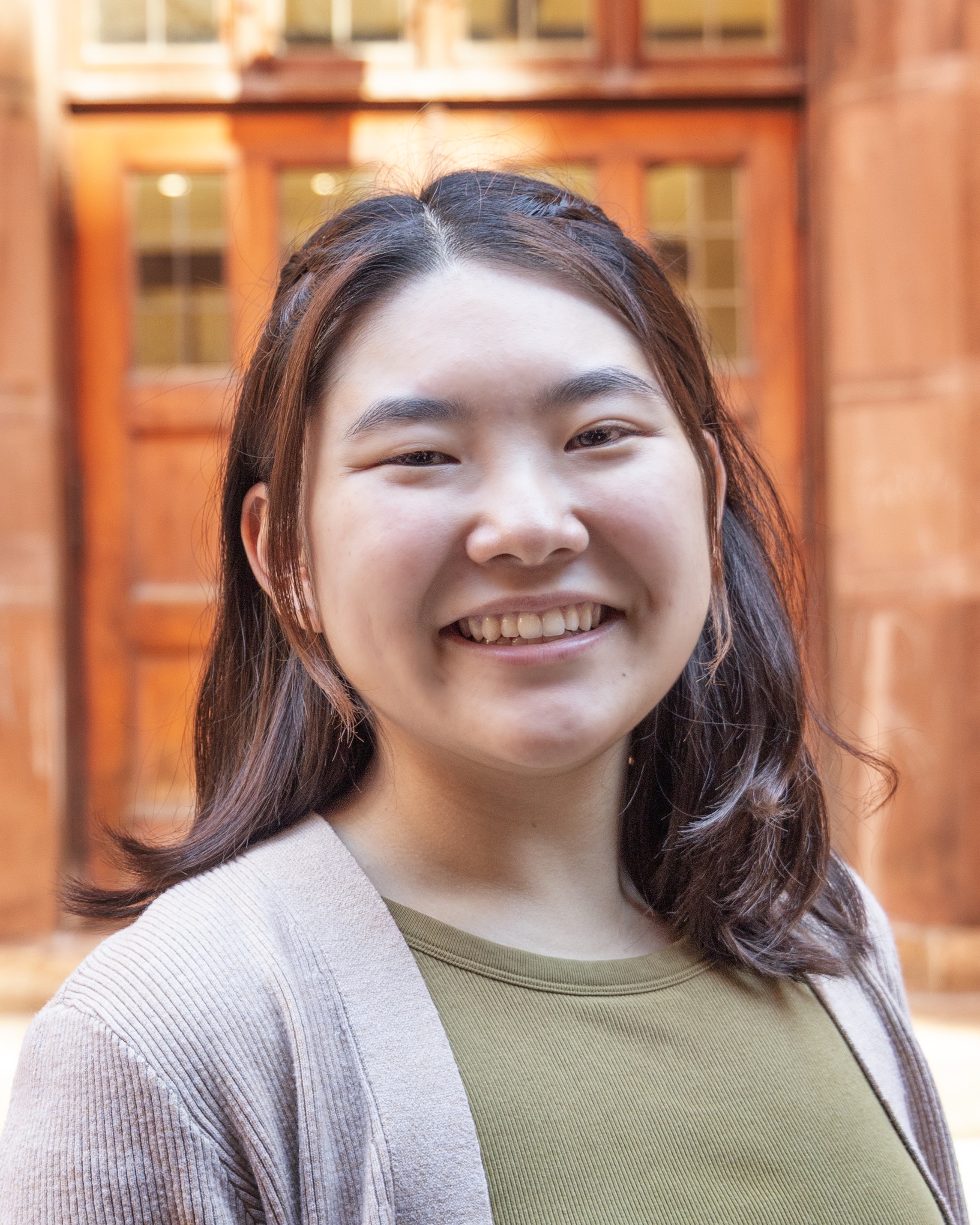 Keiko smiles at the camera