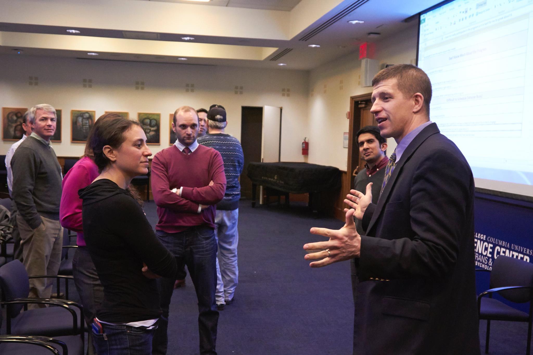 two people talking after a presentation at TC