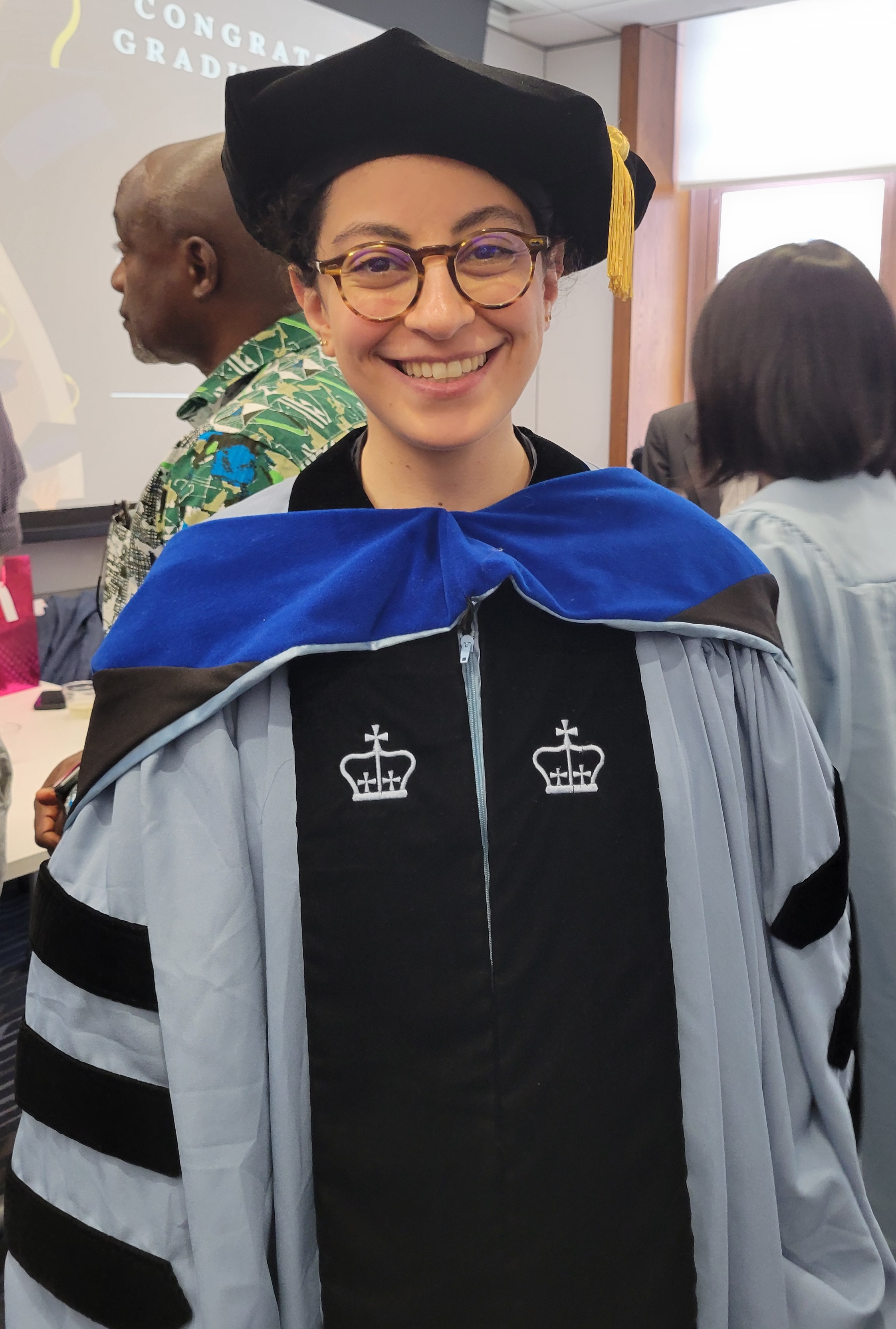 A graduate in cap and gown