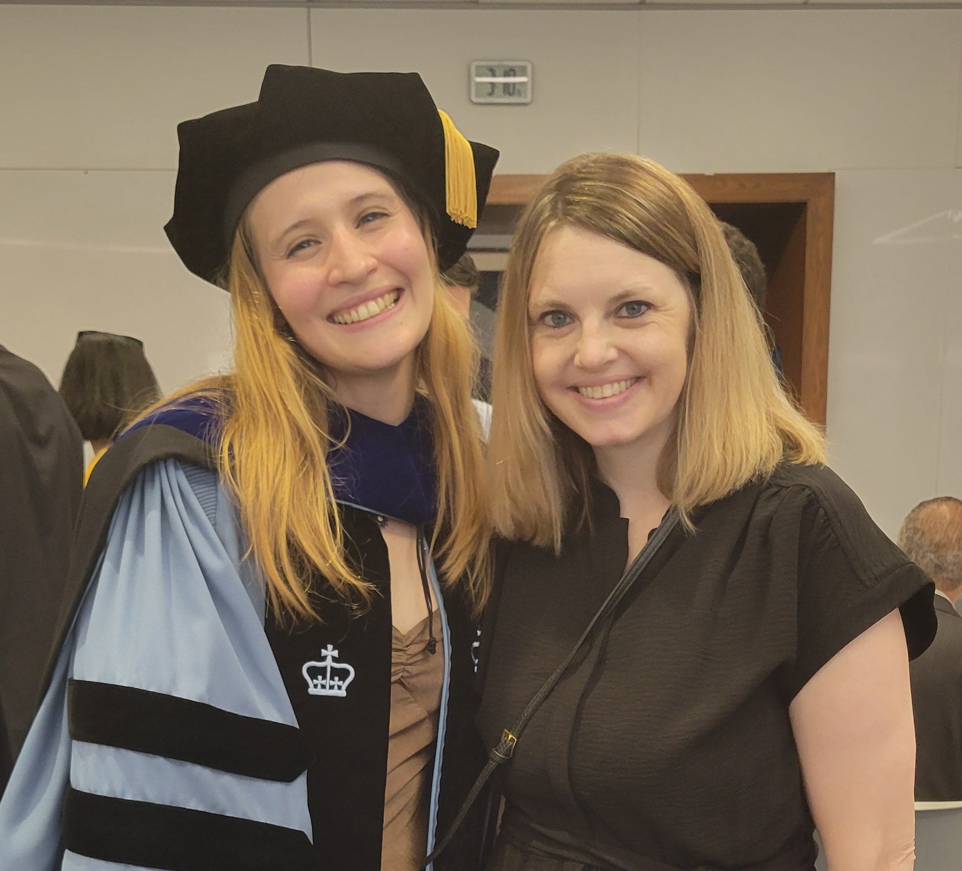 Two PhD graduates