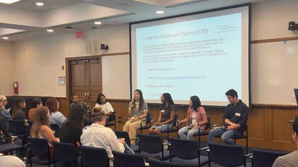 Students discussing ways to belong at TC