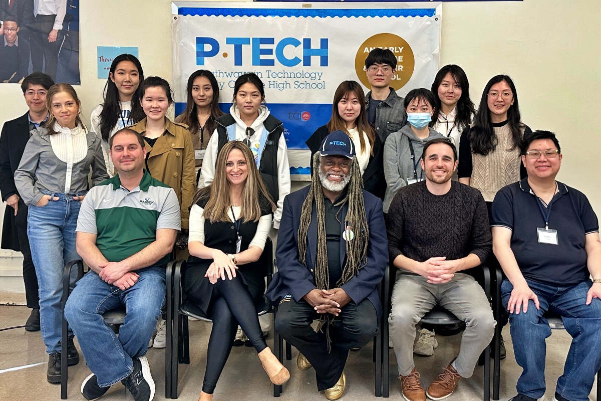 TC students with Rochy Flint and P-Tech principal in group photo