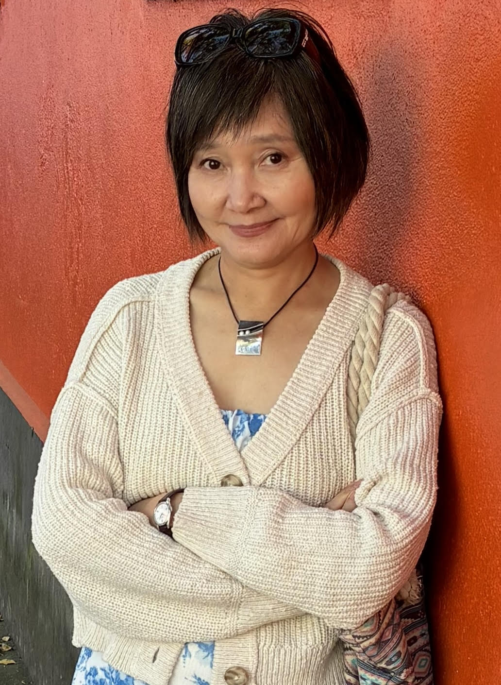 Hansun standing and smiling
