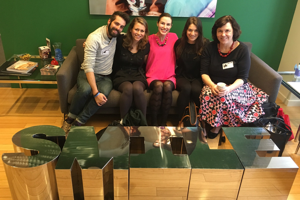 Students pose with faculty at Smile Train.