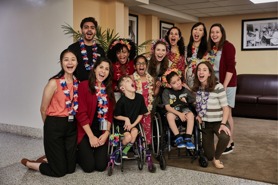 Erika Levy poses with campers and researchers