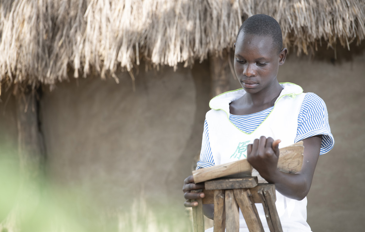 Gifty Apoko lives with grandmother student at Aywee Nursery and primary school Palabek Settlement, Uganda. Photo Credit: Emmanuel Museruka