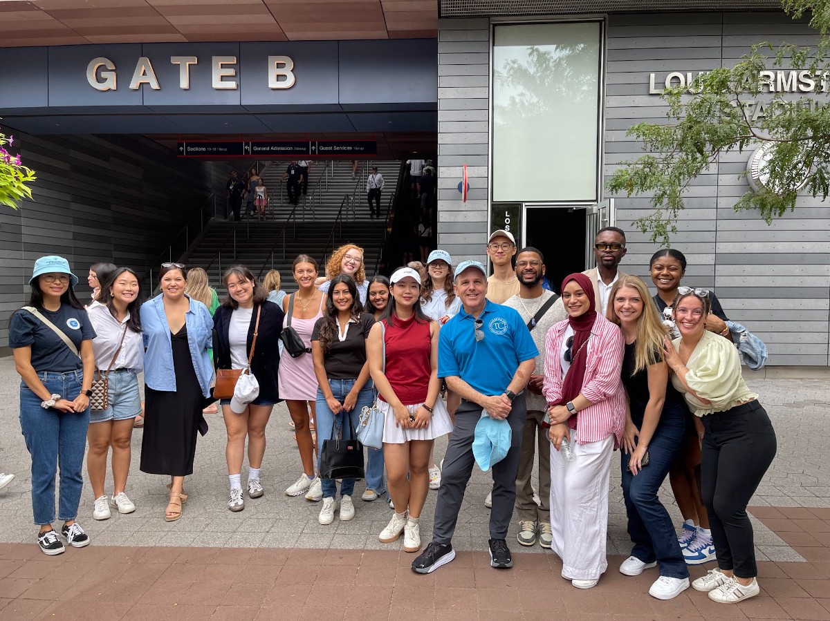 Students pose for a photo ahead of the U.S. Open.