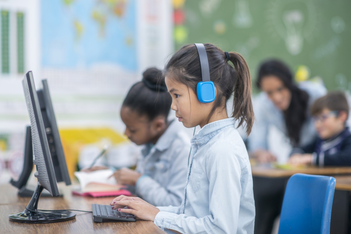 A student learning new language skills through dynamic technologies.