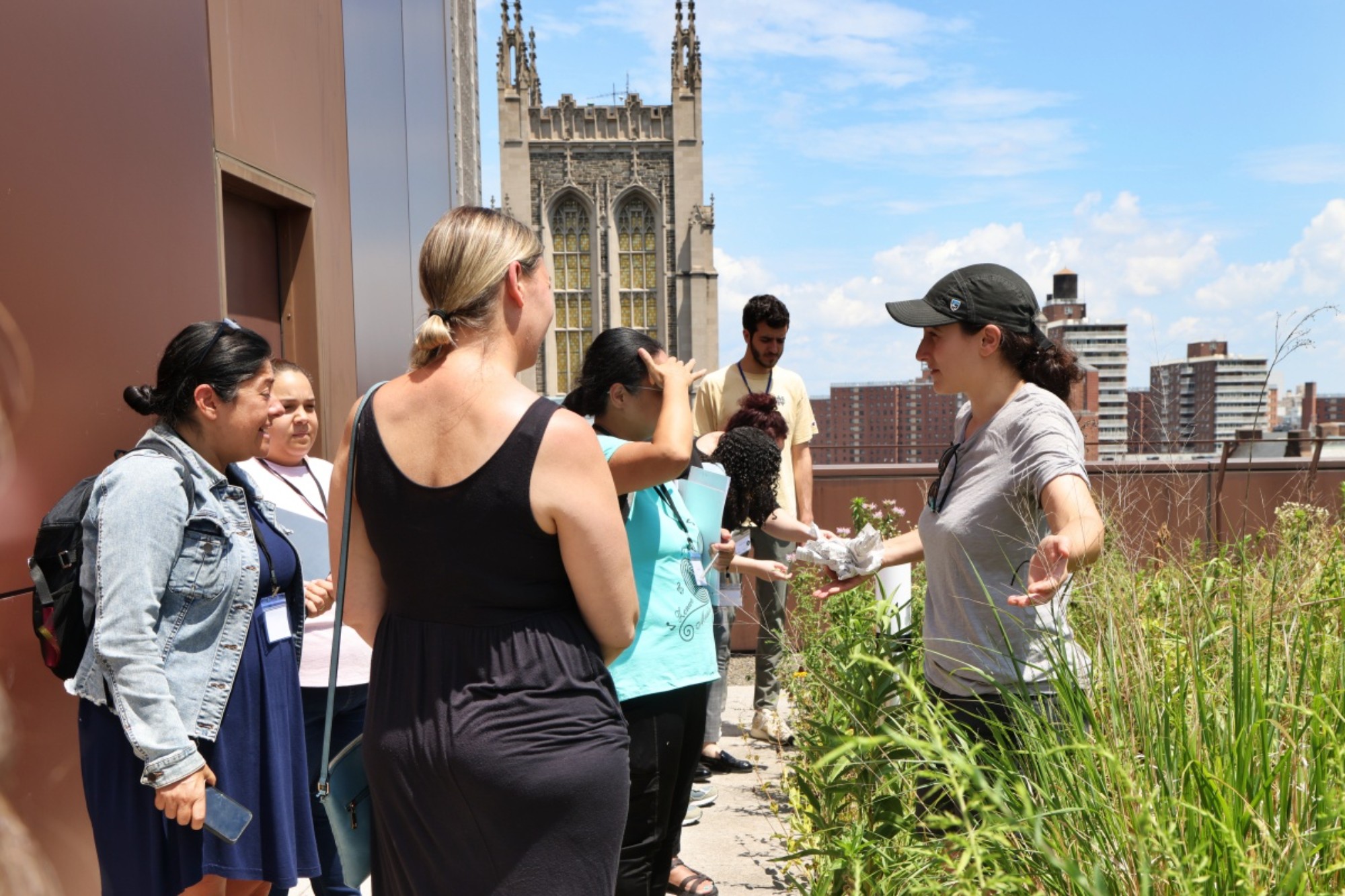 Educators on top of the Barnard rooftop greenhouse