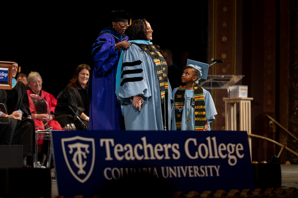 Mother/daughter doctoral hooding Convocation 2024