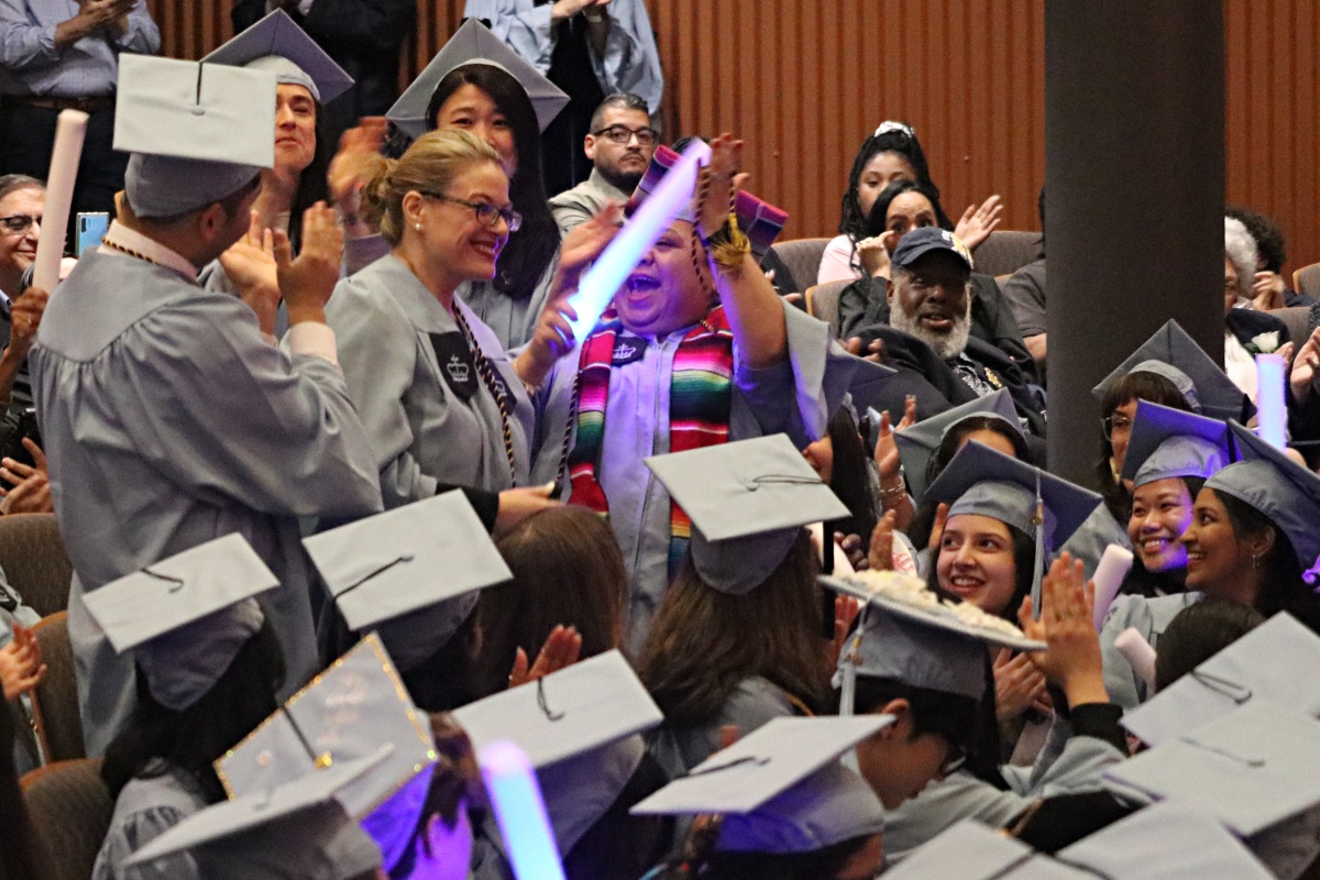 friends cheer for grad