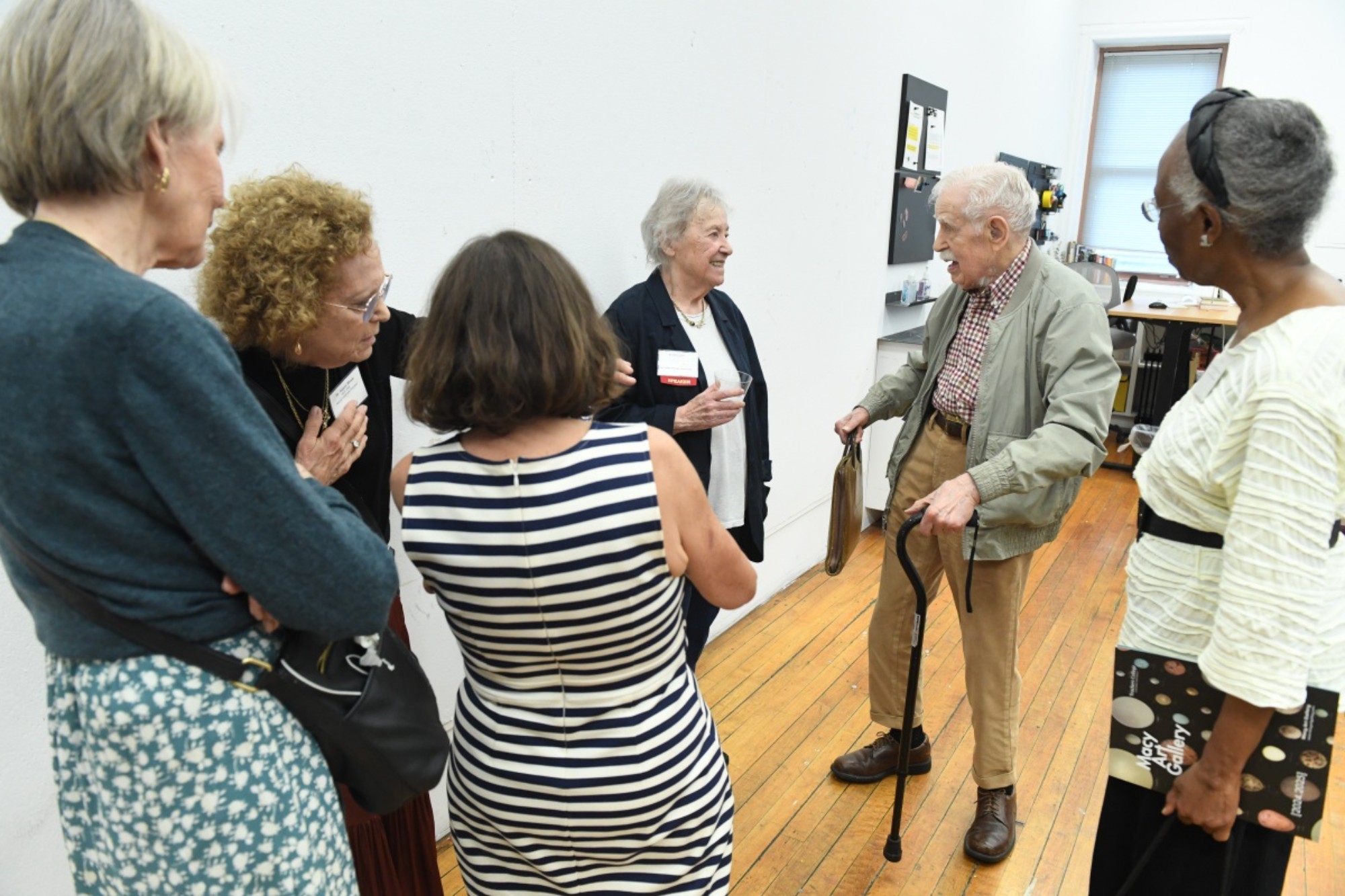 Judy Burton (center) with guests at the Silver Roundtable.