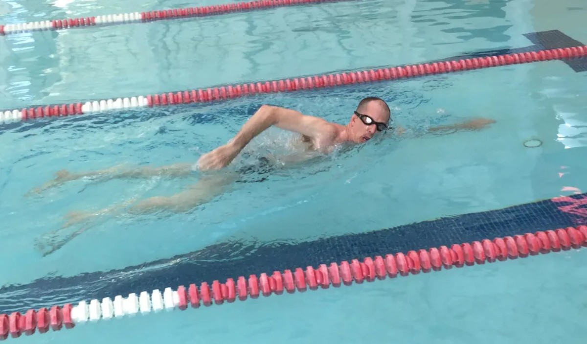 Pictured: Bruce Ballard swimming.