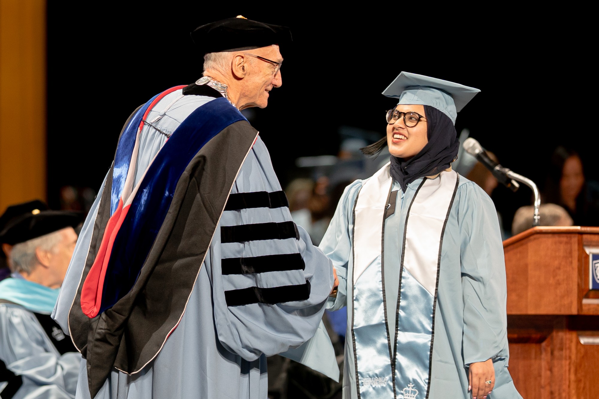 President Thomas Bailey with a member of the Class of 2025