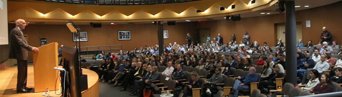 TC faculty and staff in the Cowin Auditorium